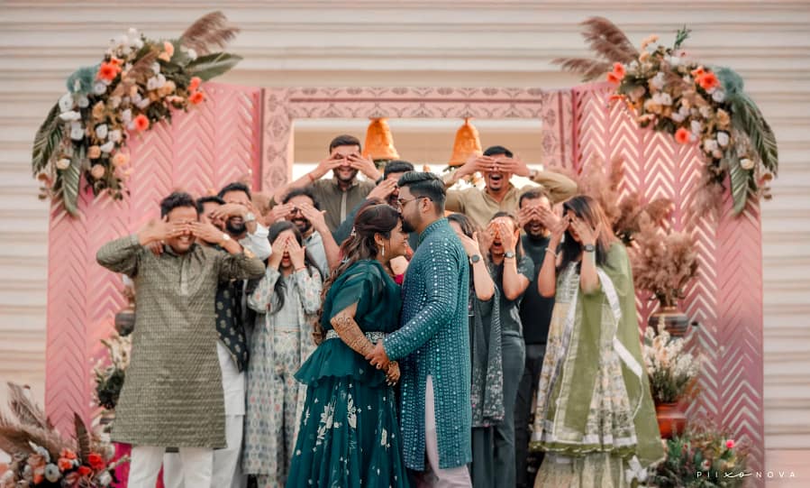 Ritika and Sumit about to kiss as guests look on